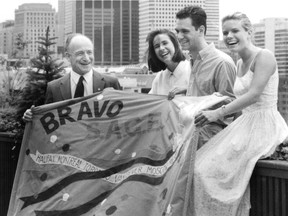 City executive committee chairman Michael Fainstat helps three national disarmament tour members hold banner on July 2, 1987. With him are Désirée McGraw, Maxime Faille, Alison Carpenter. This photo was published in the Montreal Gazette the following day, July 3.