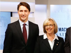 Justin Trudeau and Green Party leader Elizabeth May are shown during the federal leaders' debate in 2015. Back then, Trudeau was keen on electoral reform. Today? Not so much.