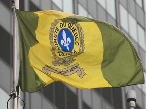 The Sûreté du Québec flag at the entrance of SQ headquarters in Montreal.