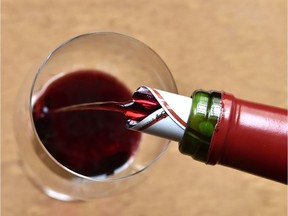 Red wine is served in a glass during a wine tasting session at the Etablissements Jean-Pierre Moueix wine merchant in Libourne, on April 10, 2018, during the 'Semaine des Primeurs' to present wines from the Bordeaux region. The event took place from April 9 until April 12, 2018. / AFP PHOTO / GEORGES GOBETGEORGES GOBET/AFP/Getty Images