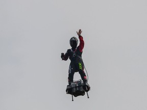 Zapata CEO Franky Zapata flies on his jet-powered hoverboard or "Flyboard" during a test flight in Saint-Inglevert, northern France, on July 24, 2019. - The French inventor aims to soar across the English Channel this week on a jet-powered "flyboard", despite authorities warning the stunt is a danger to shipping. Former jet-skiing champion Franky Zapata has pledged to go ahead on July 25, 2019 on his device, which can reach speeds up to 190 kilometres an hour (118 mph).