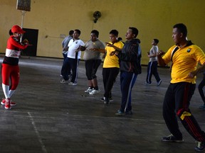 Indonesian police officers perform aerobics during a weight-loss programme in Mojokerto, East Java province, Indonesia, July 25, 2019. Picture taken July 25, 2019. REUTERS/Titik Kartitiani NO RESALES. NO ARCHIVES