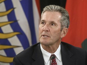 Premier of Manitoba Brian Pallister speaks to media during the Western Premiers' conference, in Edmonton on Thursday, June 27, 2019. The Manitoba government wants to recruit civil servants from Quebec who are concerned about a new law banning religious symbols.