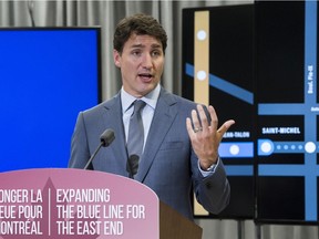 CP-Web. Prime Minister Justin Trudeau speaks during a news conference in Montreal, Thursday, July 4, 2019, where he announced a funding investment into the expansion of the Montreal Metro blue line.
