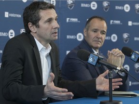 Impact coach Remi Garde, left, with Impact owner Joey Saputo as they announce the new coaching staff for the coming season in Montreal on Jan. 10, 2018.