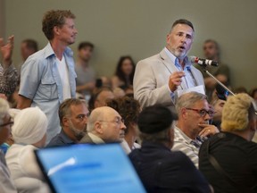 Pierrefonds-Roxboro Mayor Jim Beis, seen here speaking during consultations regarding Quebec's flood-zone map last July, will participate in a climate change/real estate conference set for Feb. 18, 2020.