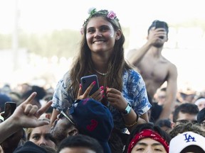 People get into the artist Gucci Mane on day 1 of the Osheaga Music and Arts Festival at Parc Jean-Drapeau in Montreal Friday, August 2, 2019. (John Kenney / MONTREAL GAZETTE) ORG XMIT: 62919