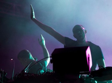 Tom Rowlands, right, and Ed Simons of the Chemical Brothers play on Day 2 of the Osheaga Music and Arts Festival at Parc Jean-Drapeau in Montreal Saturday, August 3, 2019.