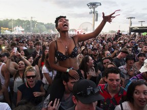 Alaska Tsegaye of Ottawa sings along to a song by the artist Hozier calledTake Me To the Church, a song she says literally saved her life, on Day 3 of the Osheaga Music and Arts Festival at Parc Jean-Drapeau in Montreal Sunday, August 4, 2019.