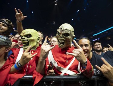 MONTREAL, QUE:  Iron Maiden fans cheer as they wait for the band to perform at the Bell Centre, in Montreal on Aug. 5, 2019.