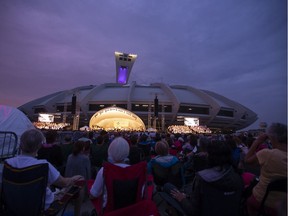 MONTREAL, QUE:  People listen at OSM's free outdoor performance of Verdi's Requiem, conducted by Kent Nagano at Olympic Park in Montreal, Quebec  August 7, 2019. (Christinne Muschi / MONTREAL GAZETTE)      ORG XMIT: 62970