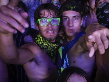 People enjoy the music of Marshmello on Day 1 of the ÎleSoniq electronic music festival at Parc Jean-Drapeau in Montreal on Friday, August 9, 2019.