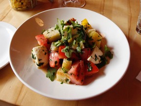 Sun-kissed heirloom tomatoes are just part of the story in this satisfying salad at Gus.