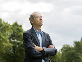 Pierre Lachapelle, president of Les Pollués de Montreal-Trudeau, poses near his home in Montreal, Monday, August 12, 2019. The group says “it only takes one plane to wake you up.”