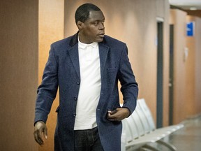 Denis Désiré walks through the Palais de Justice in Montreal on Tuesday, Aug. 13, 2019.