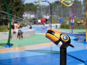 A water cannon that kids can direct like a fire hose, sprays water at the new Lake Road Park splash pad in Dollard-des-Ormeaux.