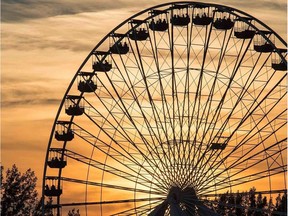 Firefighters came to the rescue of three people who were stuck on the ferris wheel at La Ronde Wednesday night.