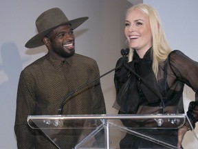 Former Montreal Canadiens player P.K. Subban with his partner Lindsey Vonn at a charity fashion show in Montreal on Thursday, Aug. 22, 2019.  The couple announced their engagement on Friday, Aug. 23, 2019.