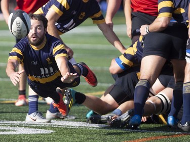 Town of Mount Royal RFC Jean-Baptiste Dargelos throws during action against Club de Rugby de Québec during the Quebec Cup Rugby Super League Final in Montreal on Saturday, Aug. 24, 2019.