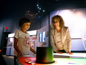 Astrophysicist and McGill professor Victoria Kaspi spent the day giving 6-year-old Zoey a tour of the Mont Mégantic Observatory. The Montreal girl had won a Barbie-National Geographic "You can be anything" contest. Photo courtesy of Barbie
