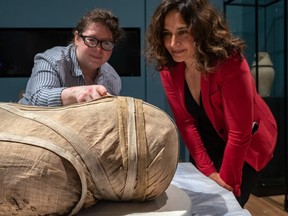 Caroline Barton, collection manager at the British Museum, left, chats with Laura Vigo, curator of Asian art and archaeology at the MMFA, in Montreal on Wednesday August 28, 2019.