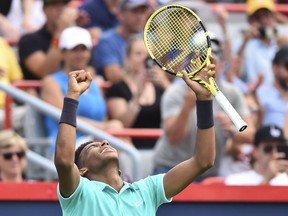 Felix Auger-Aliassime of Canada reacts after defeating Vasek Pospisil of Canada 6-2, 6-7, 7-6 during day 5 of the Rogers Cup at IGA Stadium on August 6, 2019 in Montreal.