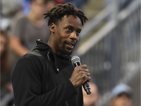 Gaël Monfils of France addresses the spectators after pulling out of his match against Rafael Nadal of Spain because of an injury during Day 9 of the Rogers Cup at IGA Stadium on Saturday, Aug. 10, 2019, in Montreal.