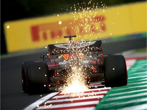 Sparks fly behind the Red Bull of Max Verstappen during Friday practice for the Hungarian Grand Prix.
