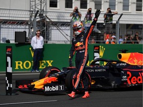 Pole position qualifier Max Verstappen of Netherlands and Red Bull Racing celebrates in parc ferme during qualifying for the F1 Grand Prix of Hungary at Hungaroring on August 03, 2019 in Budapest, Hungary.