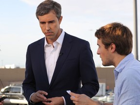Democratic presidential candidate and former Rep. Beto ORourke prepares to be interviewed outside a Walmart near the scene of a mass shooting which left at least 20 people dead on August 4, 2019 in El Paso, Texas. A 21-year-old male suspect, identified as Patrick Crusius from a Dallas suburb, surrendered to police at the scene. At least 26 people were wounded in the shooting.