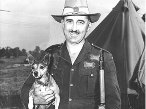 Sgt. J.H. Blais of the Royal Canadian Mounted Police, seen here in a 1952 photo with his mascot Cheeky, was a champion marksman.