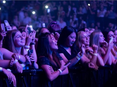 Fans watch pop star Shawn Mendes perform in Montreal, on Tuesday, August 20, 2019.