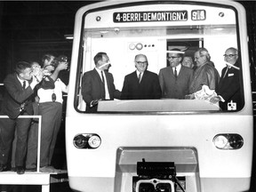 Aboard the métro car, from left: an unidentified Canadian Vickers official, Mayor Jean Drapeau, executive committee chairman Lucien Saulnier, Cardinal Paul-Émile Léger and Montreal Transit Commission chairman Lucien L'Allier, attend the ceremonial official delivery of the first car for the Montreal métro on Aug. 24, 1965 at the Metro Shop of Canadian Vickers Industries Ltd. in east end Montreal. (The man at back was not identified.)