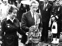 Dieppe veteran Georges Giguère prepares to place a commemorative wreath at a ceremony Aug. 25. 1985. He is accompanied by Manon Lalonde of the Fusiliers de Mont-Royal. The Dieppe raid began on Aug. 19, 1942.