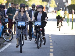 Mayor Valérie Plante rides a battery- assisted Bixi during the full launch of the electric Bixi in Montreal on Monday, Aug. 26, 2019.