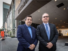 After unsuccessfully trying to deal with tenants renting out condo units on Airbnb, management of the Roccabella condo complex in downtown Montreal had to resort to hiring GardaWorld investigators to go undercover and catch the tenants in the act. Roccabella Director of Building Operations, Carmine Mangiante, left, and Serge Labelle, of MC Finance, in front of the Roccabella condo tower in Montreal.