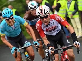 Belgium's Bjorg Lambrecht (R) leads a breakaway on June 09, 2019, during the first stage of the 71st Criterium du Dauphine cycling race.