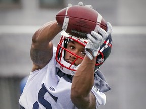 Reciever DeVier Posey catches pass fired by a Jugs machine during Montreal Alouettes training camp practice on May 24, 2019.