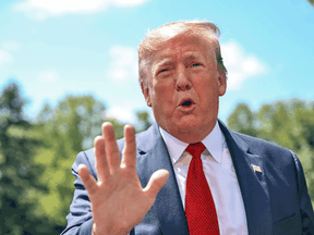 U.S. President Donald Trump speaks to reporters from the South Lawn of the White House on Aug. 21, 2019.