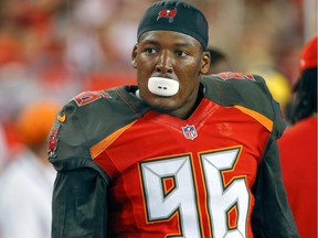 Tampa Bay Buccaneers defensive end Ryan Russell on the bench during the second half of an NFL football game at Raymond James Stadium.