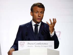 French President Emmanuel Macron attends a press conference during the G7 summit in Biarritz, France, August 26, 2019.