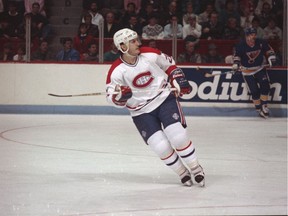 Canadiens forward Guy Carbonneau #21 skating against the St. Louis Blues  at the Montreal Forum during the 1987-88 season.