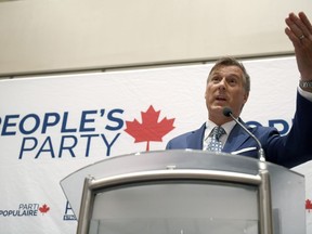 People's Party of Canada leader Maxime Bernier delivers an address at the PPC National Conference in Gatineau, Que. on Sunday, Aug.18, 2019.