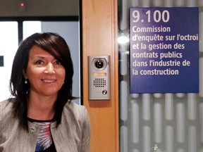 Nathalie Normandeau, former deputy premier of Quebec and a member of the Quebec Liberal Party leaves the Charbonneau Commission in Montreal, on Tuesday, June 17, 2014.