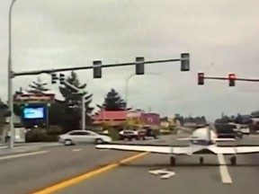 A plane's emergency landing was caught on a police car's dashcam.