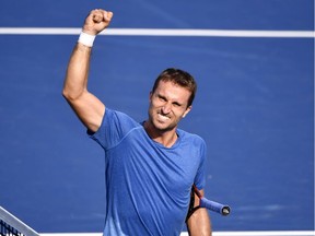 Aug 3, 2019; Montreal, Quebec, Canada; Steven Diez of Canada reacts after defeating Alexander Bublik of Kazakhstan (not pictured) during the Rogers Cup tennis tournament at Stade IGA. Mandatory Credit: Eric Bolte-USA TODAY Sports