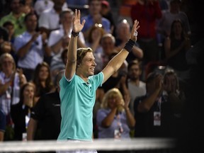 Denis Shapovalov of Canada reacts after defeating Pierre-Hughes Herbert of France (not pictured) during the Rogers Cup tennis tournament at IGA Stadium in Montreal on Aug. 5, 2019.