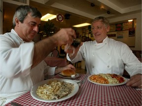 Giovanni Montanari (right) and Vito Lanzisera of the Rotisserie Italienne raise a glass of red wine. Montanari died in July.