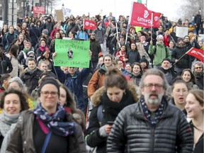 Demonstrators walk south on Park Ave. in Montreal on Friday, March 15, 2019 while taking part in the worldwide Youth Climate Strike.