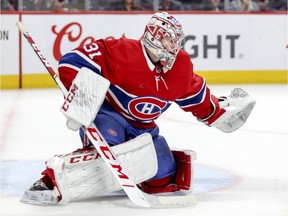 Canadiens goalie Carey Price slides across the crease to make save during NHL game against the New York Islanders at the Bell Centre in Montreal on March 21, 2019.